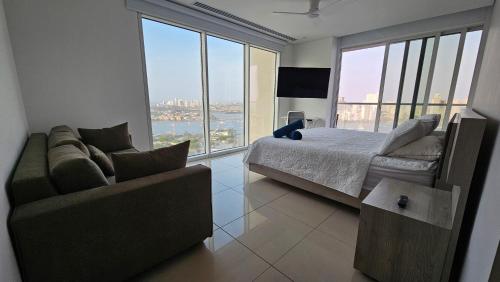 Postel nebo postele na pokoji v ubytování Apartamentos Condominio H2 Bocagrande Por Parceros Group