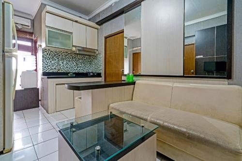 Η κουζίνα ή μικρή κουζίνα στο OYO Life 92718 Apartement Gateway Cicadas