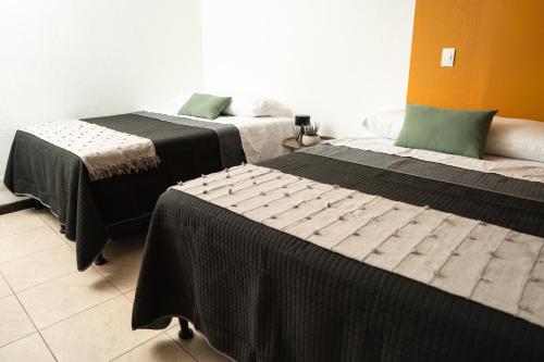 Ένα ή περισσότερα κρεβάτια σε δωμάτιο στο Central Hostel Dolce Vita