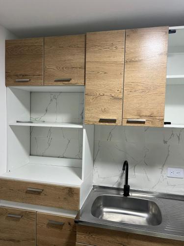 Kuchyň nebo kuchyňský kout v ubytování Alojamiento Privado en Avenida Principal