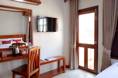 Postel nebo postele na pokoji v ubytování Tony Resort