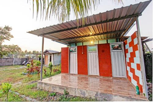 Κήπος έξω από το OYO 93121 Abi Bungalow & Hostel