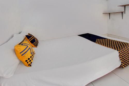 Letto o letti in una camera di OYO Life 93153 Kos Jenggala