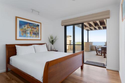 Postel nebo postele na pokoji v ubytování Ocean Views I Private Properties