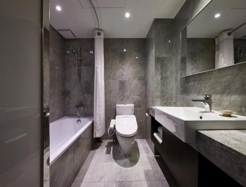 Koupelna v ubytování K Hotel Tianjin