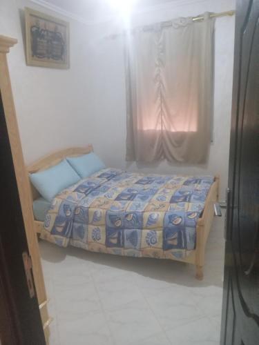 Postel nebo postele na pokoji v ubytování Appartement al houceima