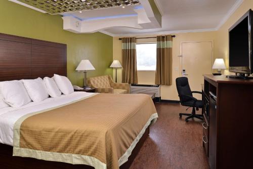 Ένα ή περισσότερα κρεβάτια σε δωμάτιο στο Americas Best Value Inn Winona