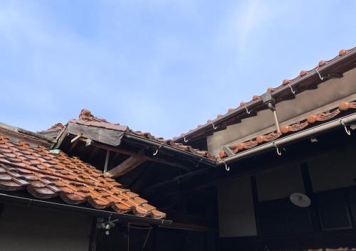 a roof of a building with tiles on it at Koyado Namiji in Matsue