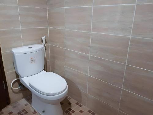 Ванная комната в Hotel O Emmy Homestay Syariah