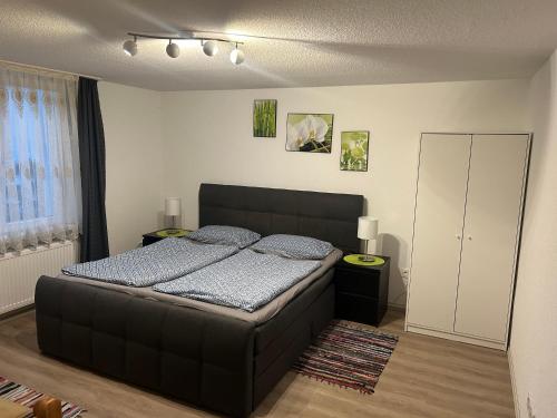 Postel nebo postele na pokoji v ubytování FERIENHAUS AyNa, direkt an der Schweizer Grenze