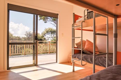 Postel nebo postele na pokoji v ubytování Tree House