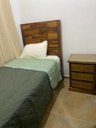 Ένα ή περισσότερα κρεβάτια σε δωμάτιο στο Bungalows Anton