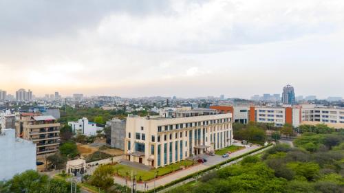 an aerial view of a city with buildings at Eternal Oasis by Alaya Stays, Golf Course Road in Gurgaon