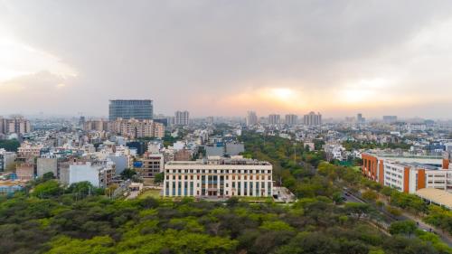 an aerial view of a city with buildings at Eternal Oasis by Alaya Stays, Golf Course Road in Gurgaon