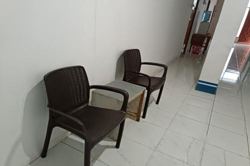 Гостиная зона в Hotel O Penginapan Laras PaminggirNearPesona Alam Seafood Pink Mira