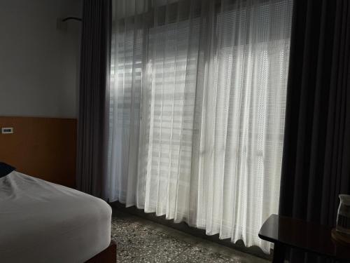 Postel nebo postele na pokoji v ubytování 明月Agetsu