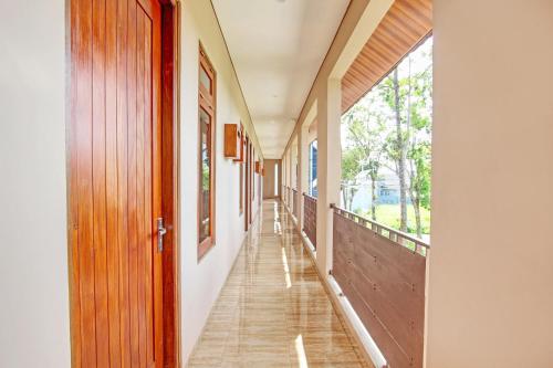 Φωτογραφία από το άλμπουμ του OYO Life 93497 Griya Kost Rr σε Salatiga