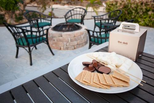 a plate of crackers and snacks on a table at Hyatt Regency Guam in Tumon