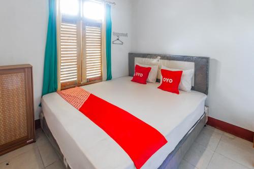 Photo de la galerie de l'établissement OYO 93729 Radesa Family Homestay, à Kuta Lombok