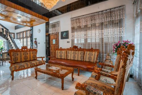 Gallery image of OYO 93706 Penginapan Syariah Hj. Kenan in Bukittinggi