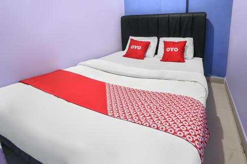 Ένα ή περισσότερα κρεβάτια σε δωμάτιο στο Hotel O Iconiq Rooms