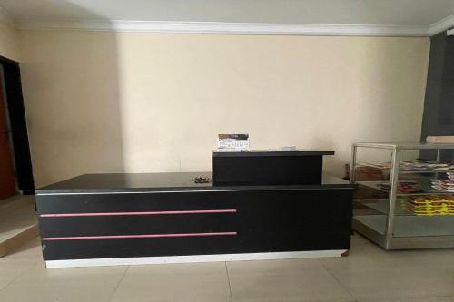Kuchyň nebo kuchyňský kout v ubytování Hotel O Setia Budi Guest House 2