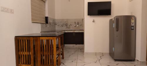 Kuchyň nebo kuchyňský kout v ubytování Zensta Residency