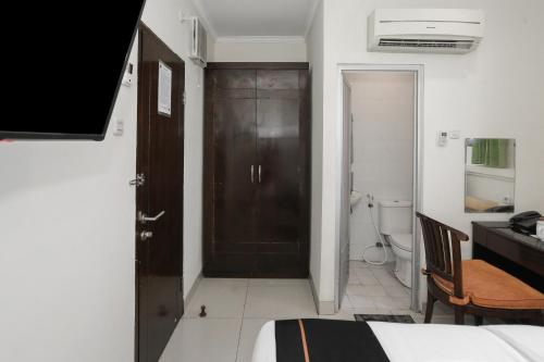 Телевизор и/или развлекательный центр в Townhouse Oak J&b Gunung Sahari