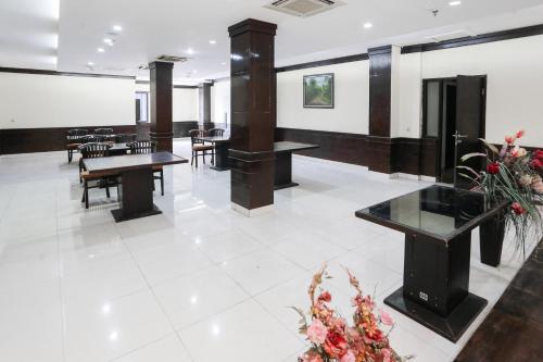 Телевизор и/или развлекательный центр в Townhouse Oak J&b Gunung Sahari
