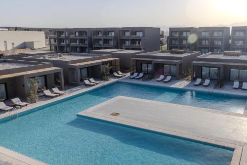 an aerial view of a hotel with a swimming pool at Aldiana Club Naga Bay in Hurghada