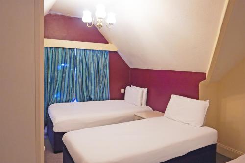 Langford Hotel, Brighton & Hoveにあるベッド