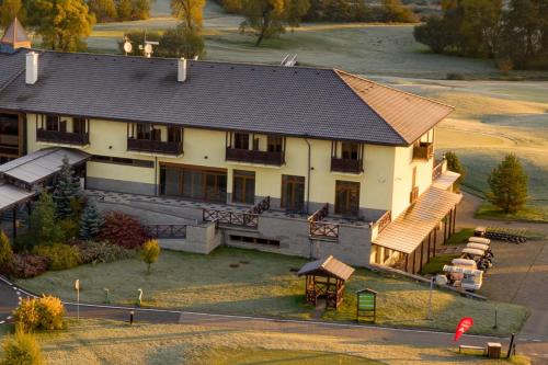 an aerial view of a large house at Hotel International in Tatranská Lomnica