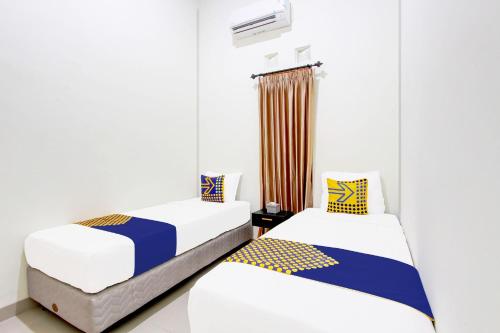 Φωτογραφία από το άλμπουμ του Hotel O Tinampi House Syariah σε Blora
