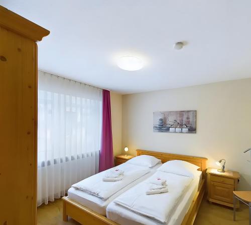 Katil atau katil-katil dalam bilik di Fewo mit Bergblick, Pool, Sauna