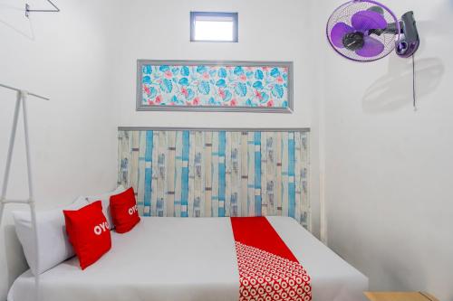 Ένα ή περισσότερα κρεβάτια σε δωμάτιο στο Hotel O Forzando Hotel