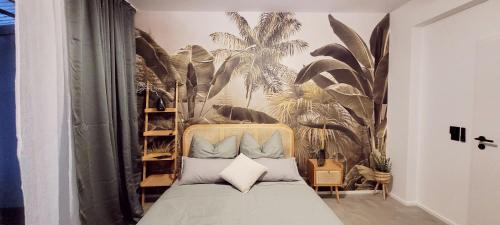 Ένα ή περισσότερα κρεβάτια σε δωμάτιο στο Apartment Bali - live better with AH Living