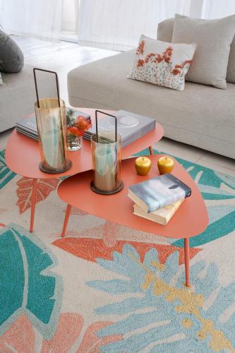 a red coffee table in a living room at Elysium Boutique Apartments - Catania in Catania
