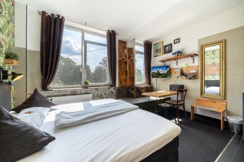 Cama o camas de una habitación en Aappartel City Center - kontaktloser Check-in 24h