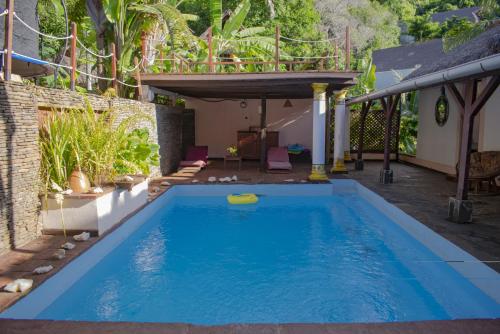 a swimming pool with a frisbee in the water at Hotel Les Boucaniers in Ambatoloaka