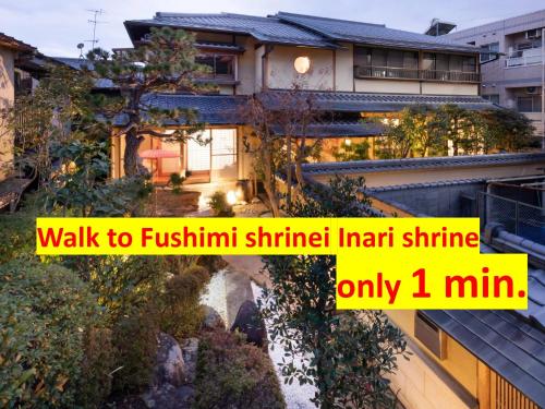 a view of a building with a walk to akritini shiminiini at Kyo-machiya Stay WAKA Fushimiinari in Kyoto