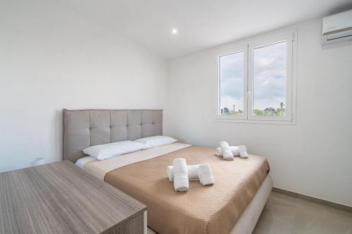 Postel nebo postele na pokoji v ubytování Casa Tiziano