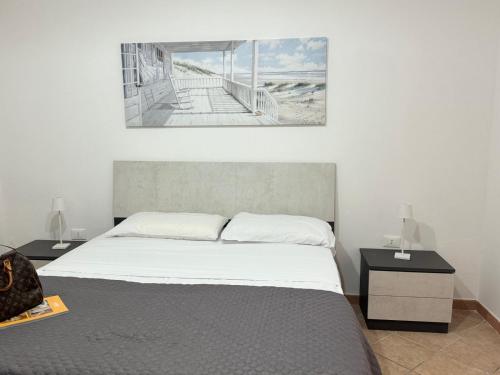 Postel nebo postele na pokoji v ubytování The Apartments Tropea