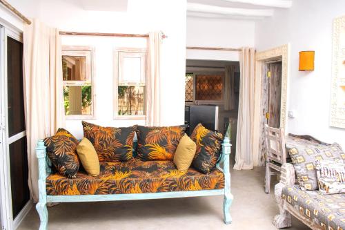 Χώρος καθιστικού στο Palm Beach cottage Sophia