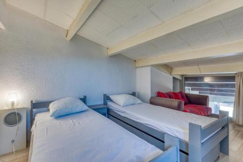 Ένα ή περισσότερα κρεβάτια σε δωμάτιο στο Appartement T2 Cap d'Ag