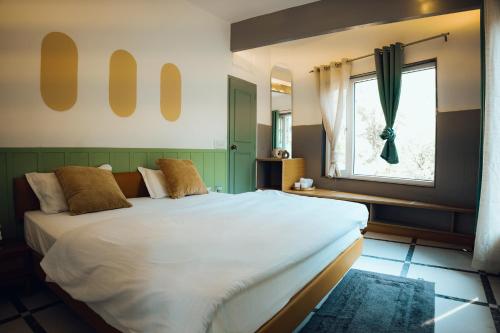 Postel nebo postele na pokoji v ubytování Art Bliss Hostel