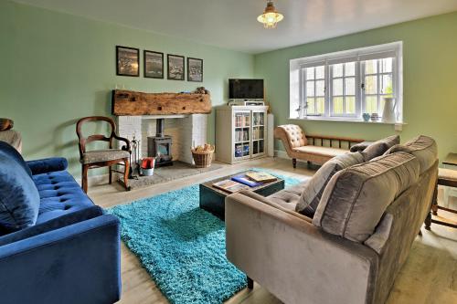 a living room with two couches and a fireplace at Finest Retreats - 3 Elm Cottage in Carhampton