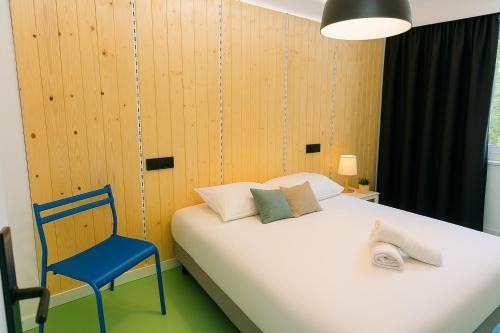 Postel nebo postele na pokoji v ubytování Koala Hostel Mercado