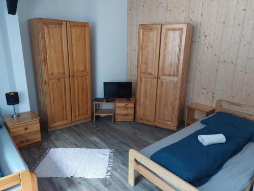 Postel nebo postele na pokoji v ubytování Penzión Kupfer