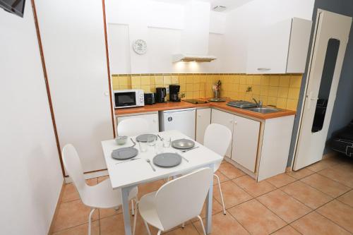 Kuchyň nebo kuchyňský kout v ubytování Grand studio 5 pour 2 a 4 p