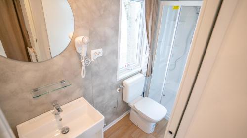 Koupelna v ubytování Happy Camp in Don Antonio Glamping Village